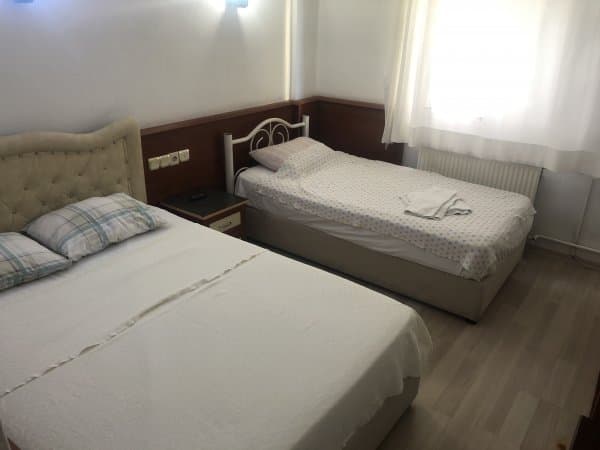 Üç Kişilik Deniz Manzaralı Oda 4