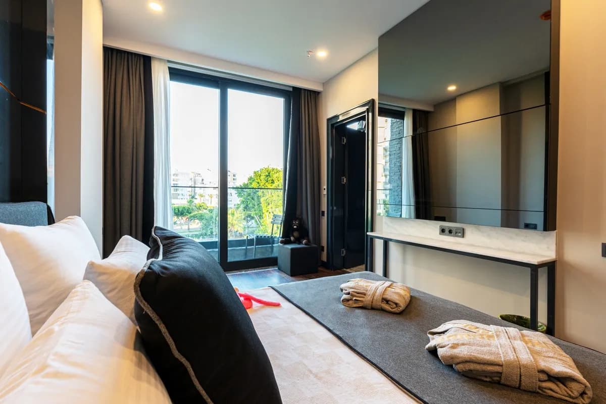 Üç Kişilik Bahçe Manzaralı Oda 2