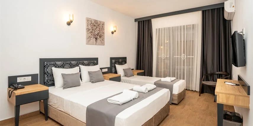 Standart 3 Kişilik Oda Kısmi Arka Bahçe Manzaralı Balkonsuz 2