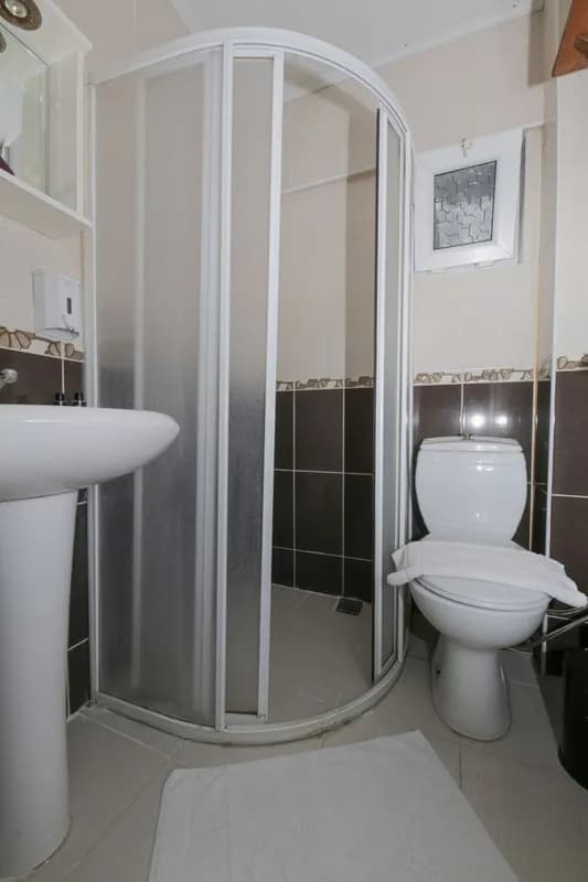 Triple Kısmi Deniz Manzaralı Balkonlu3 Kişilik  Oda 4