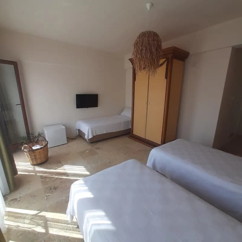 Kısmi Deniz Manzaralı Üç Kişilik Deluxe Oda 3