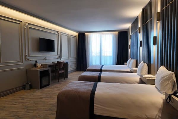 Superior Aile Odası Double + 2 Single Yatak 4