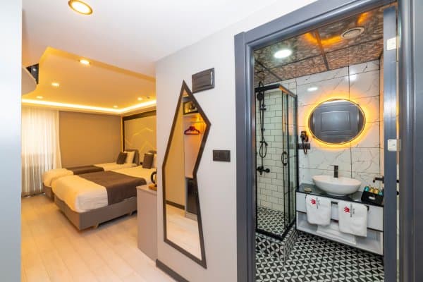 Deluxe 3 kişilik oda 22m² 1