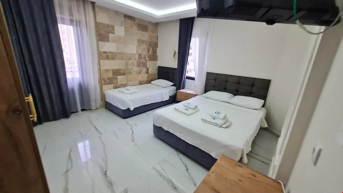 Üç Kişilik Kara veya Deniz Manzaralı 1