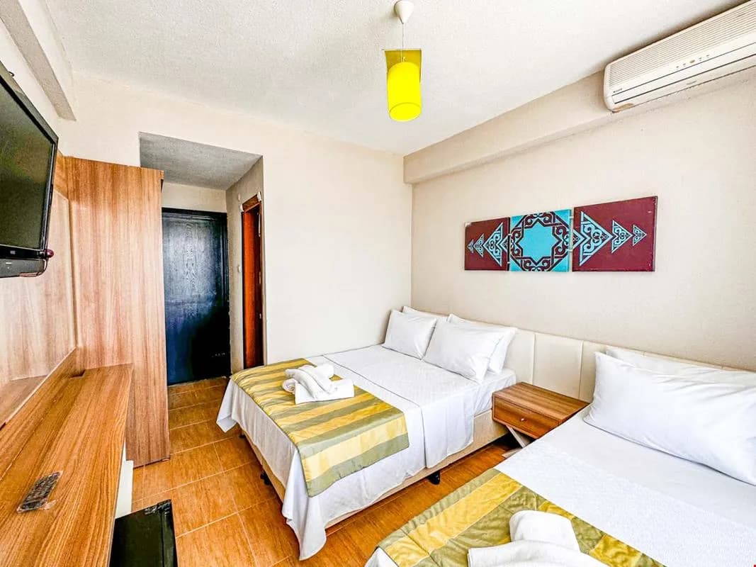 Deniz Manzaralı Delüks Üç Kişilik Oda 4