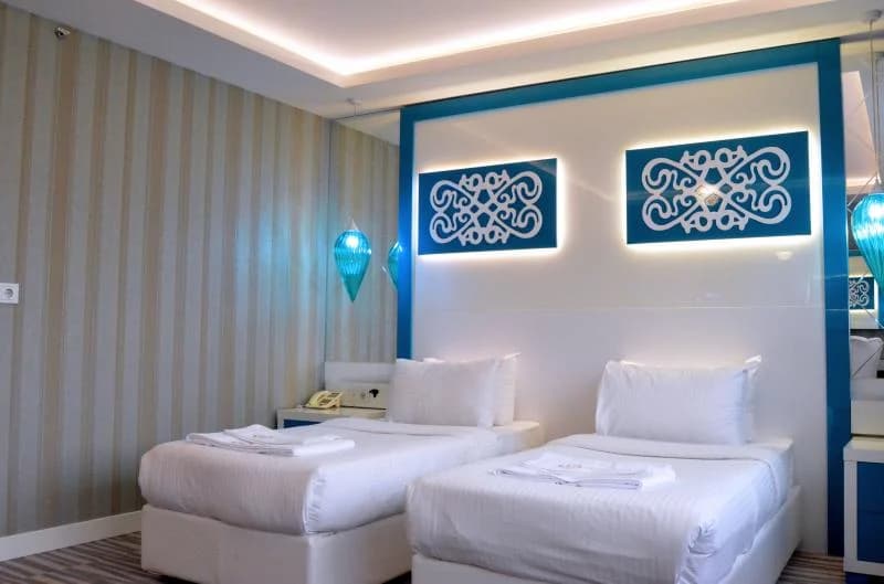 Deluxe İki Tek Yataklı Oda 1