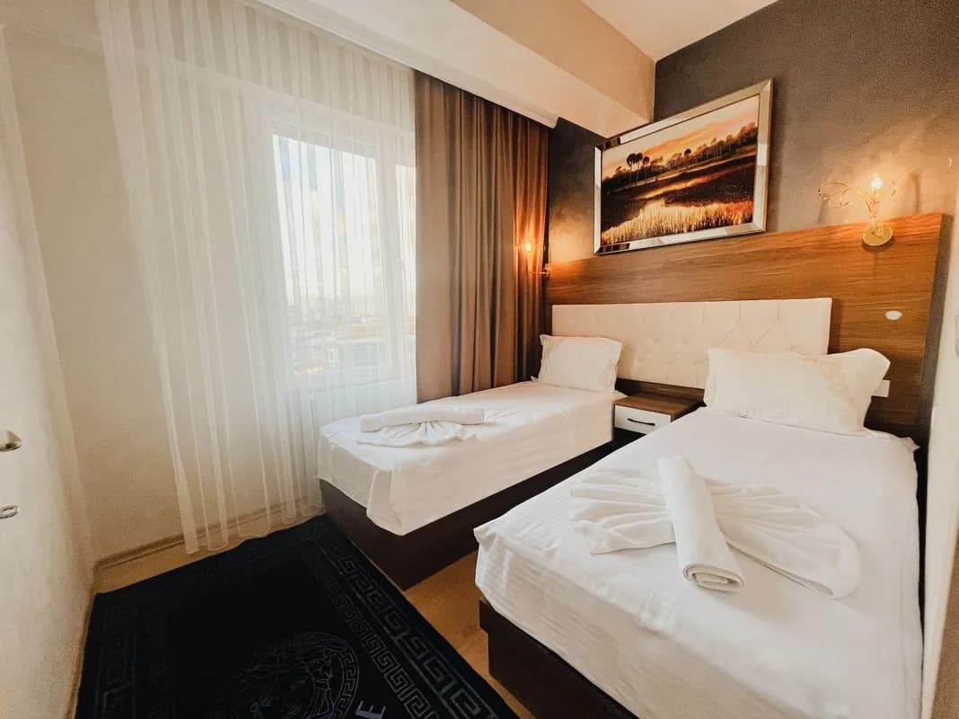 2+1 Şehir ve Deniz Manzaralı Oda 3