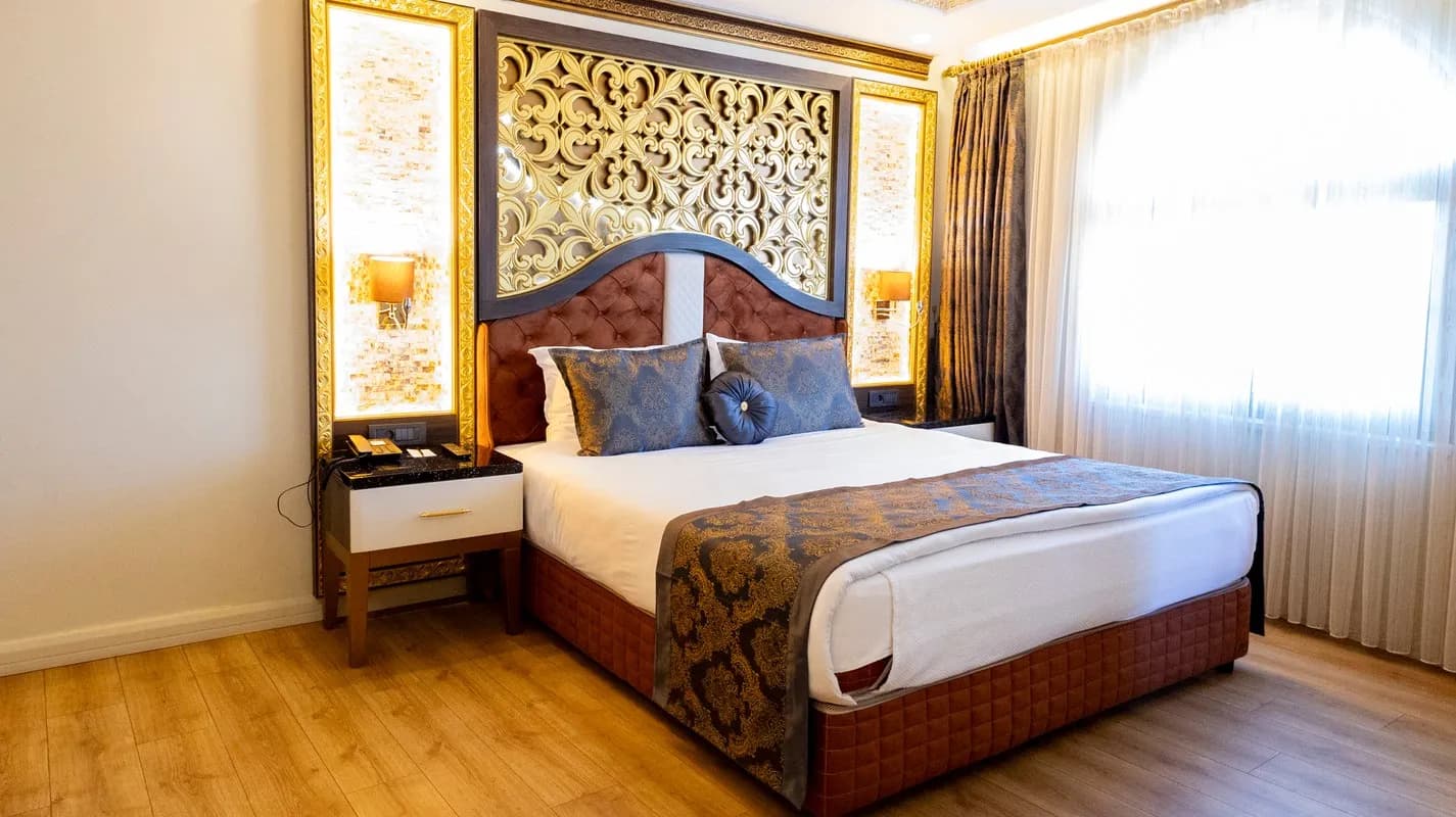 Deluxe Tek Büyük Yataklı 1