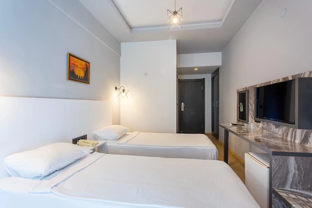 Deluxe Üç Kişilik Oda 1