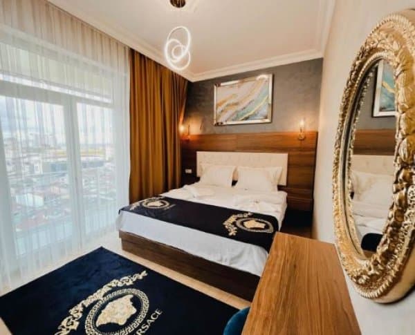 Üç Kişilik Şehir Manzaralı Oda 2